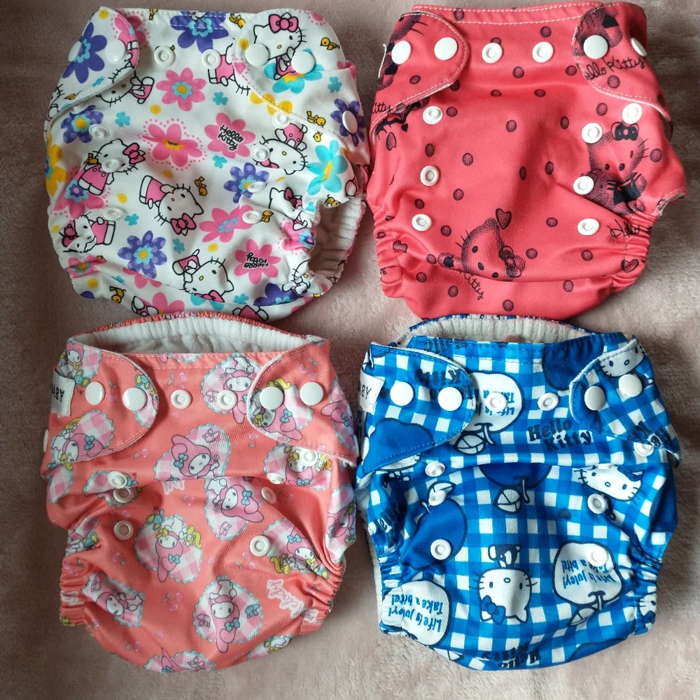 Sunbaby Hello Kitty Sanrio one-size pocket cloth diapers (lot of 8)